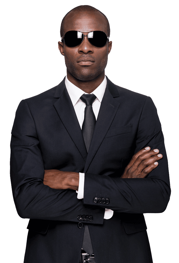 black man wearing glasses and pent coat in formal dress